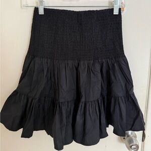 Maje Short skirt with smocking and ruffles